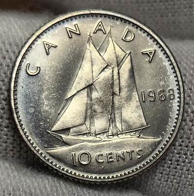 外国优质银币非洲美洲币，周六九点倒数截拍，满百包邮，持续收拍 - 加拿大1968 年精制 10 分币，正面是伊丽莎白二世像，背面绘帆船图案（呼应加拿大航海文化），币面风格简洁，是该国经典流通币，兼具历史流通与收藏纪念价值。