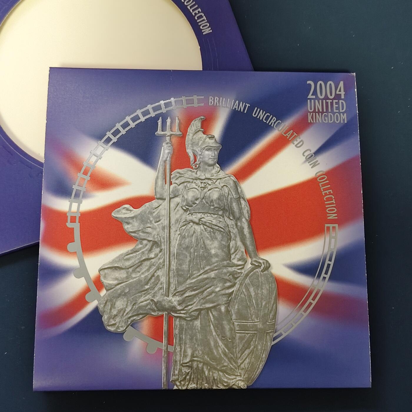 【全场包邮】纯粹捡漏拍492场【封装套币专场】-注意佣金 英国2004年官方封装套币-含2镑首辆火车200周年+2镑机械时代+1镑第四铁路桥+50便士罗杰班尼斯4分钟1英里4枚纪念币+流通套币