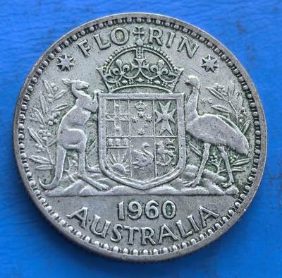 外国优质银币非洲美洲币，周六九点倒数截拍，满百包邮，持续收拍 - 澳大利亚1960 年弗洛林银币11克纯银价102元，币面饰袋鼠、鸸鹋与国徽，关联英联邦时期澳洲货币史，流通包浆独特，兼具地域文化标识与钱币收藏价值。