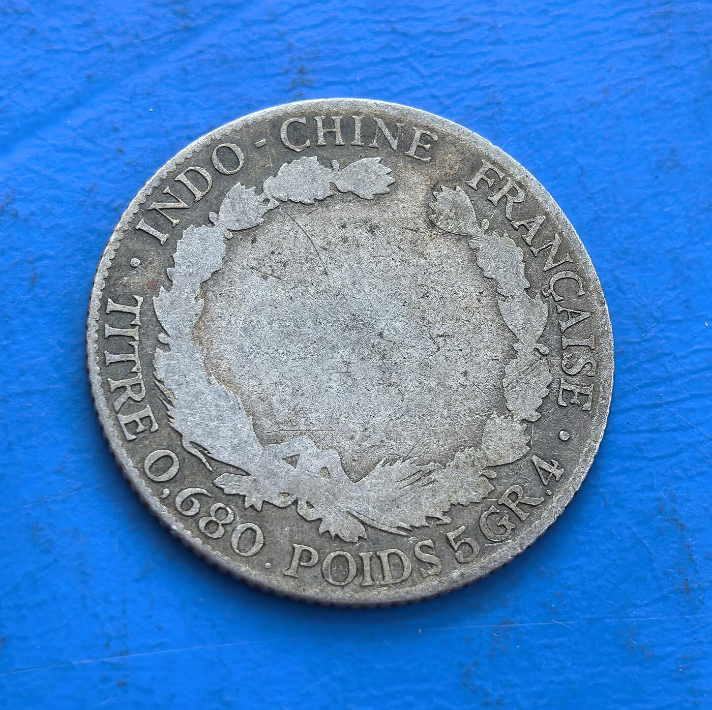 外国优质银币非洲美洲币，周六九点倒数截拍，满百包邮，持续收拍 法属印支1922 年坐洋20分银币纯银价65元，正面是手持火炬的自由女神像，背面花环环绕，是殖民时期流通币，年份清晰、历史感足，收藏中常见的经典老银币。