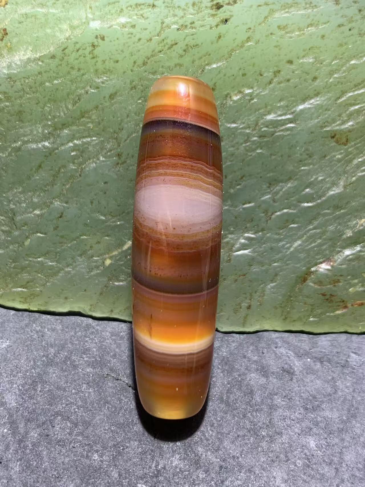 高玉化千层纹巴西玛瑙随形通货桶珠一个，，