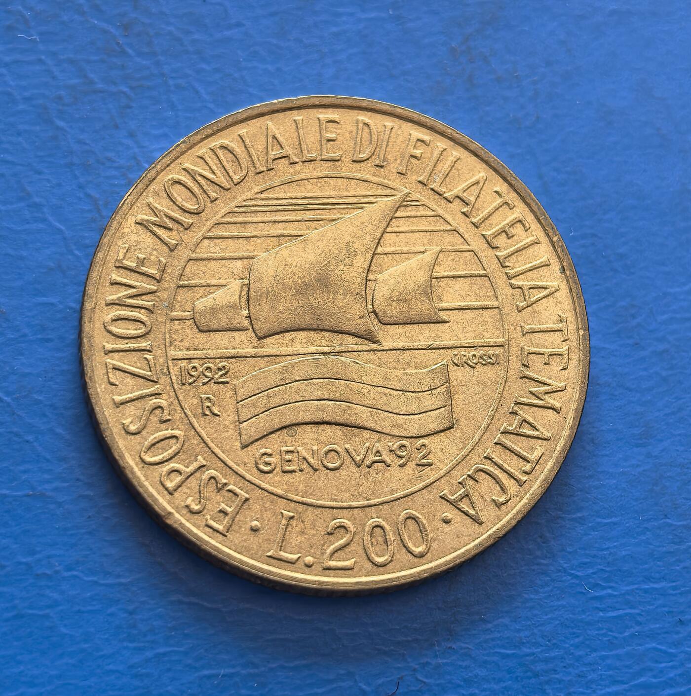 外国优质银币非洲美洲币，周六九点倒数截拍，满百包邮，持续收拍 意大利1992 年热那亚邮展 200 里拉纪念币，正面绘帆船（邮展主题）+“GENOVA92” 标识，背面印意大利女神像，金属币兼具展会纪念与国家符号，收藏主题鲜明。