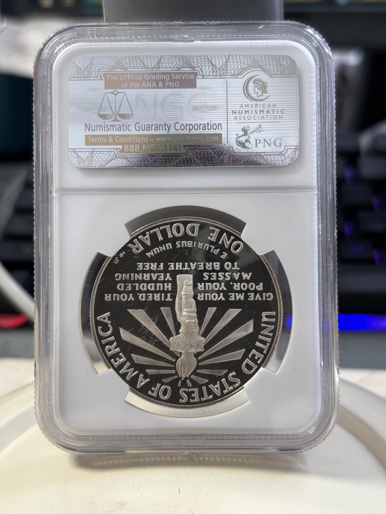 第187期拍卖 获奖币美国1986年自由女神百年精制纪念银币NGC-PF69，26.72克，900银