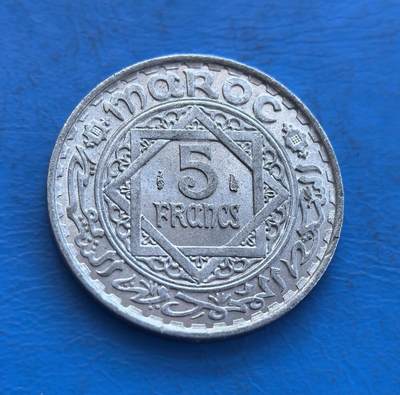 外国优质银币非洲美洲币，周六九点倒数截拍，满百包邮，持续收拍 - 极美品原光摩洛哥（谢里夫帝国时期）1950年5 法郎硬币，币面融伊斯兰几何纹饰与阿拉伯文，风格体现北非伊斯兰文化，属摩洛哥近代货币，具地域文化与历史货币收藏价值。