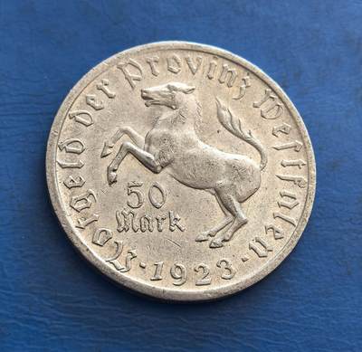 外国优质银币非洲美洲币，周六九点倒数截拍，满百包邮，持续收拍 - 德国1923 年威斯特伐利亚 50 马克币（德国通胀期），正面展奔马纹饰 + 币值，背面印安妮女像 + 地域标识，承载魏玛共和国通胀期货币文化，具历史与特殊经济背景收藏价值。