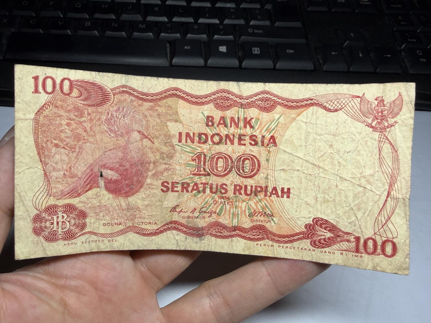 2026年集古藏今外币拍卖第一期-第3场—（总第300拍-纸币专场），本期拍完结算一次，发货时间2-3天，休息几天后继续新的一期拍卖。 1984年印尼100盾