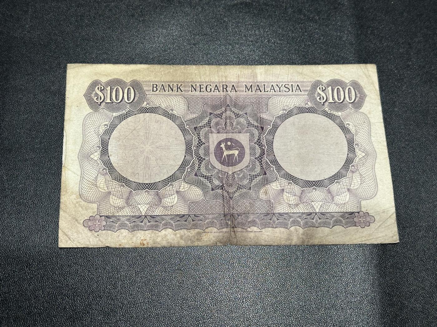 《外钞收藏家》第六百零一期（畅拍场）（本平台长期征集拍品、欢迎藏友们联系合作） 马来西亚第一版100林吉特 非全新 品相如图
