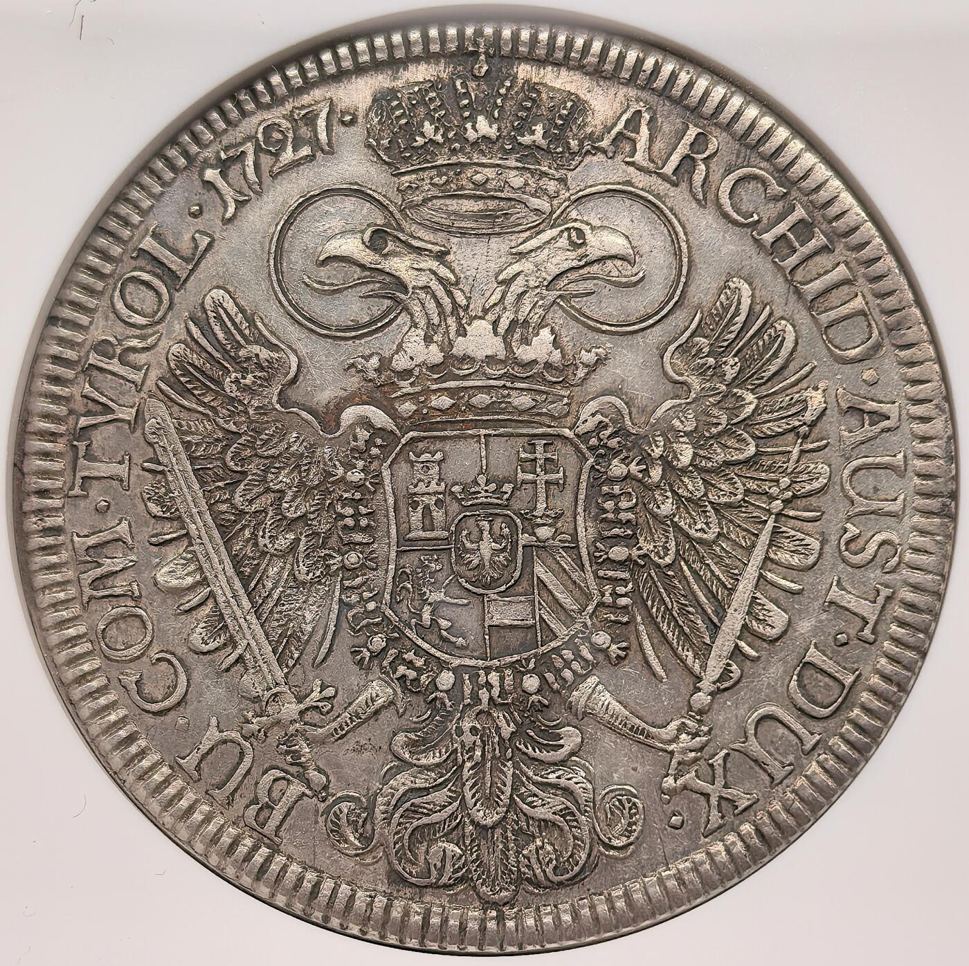 凡希社世界钱币微拍第三百十八期 荐！1727神罗哈布斯堡王朝卡尔六世戎装像泰勒大银NGC-MS61，铁灰色包浆，注意正面的卷发和月桂冠细节。1727年正值卡尔六世推动《国本诏书》确立哈布斯堡家族继承规则的关键时期，此币是神圣罗马帝国中期货币体系的重要实物，布雷斯劳铸币厂版本少于维也纳铸币厂版本，它直观地反映了帝国东部领地的铸币权分布。（视频参考）