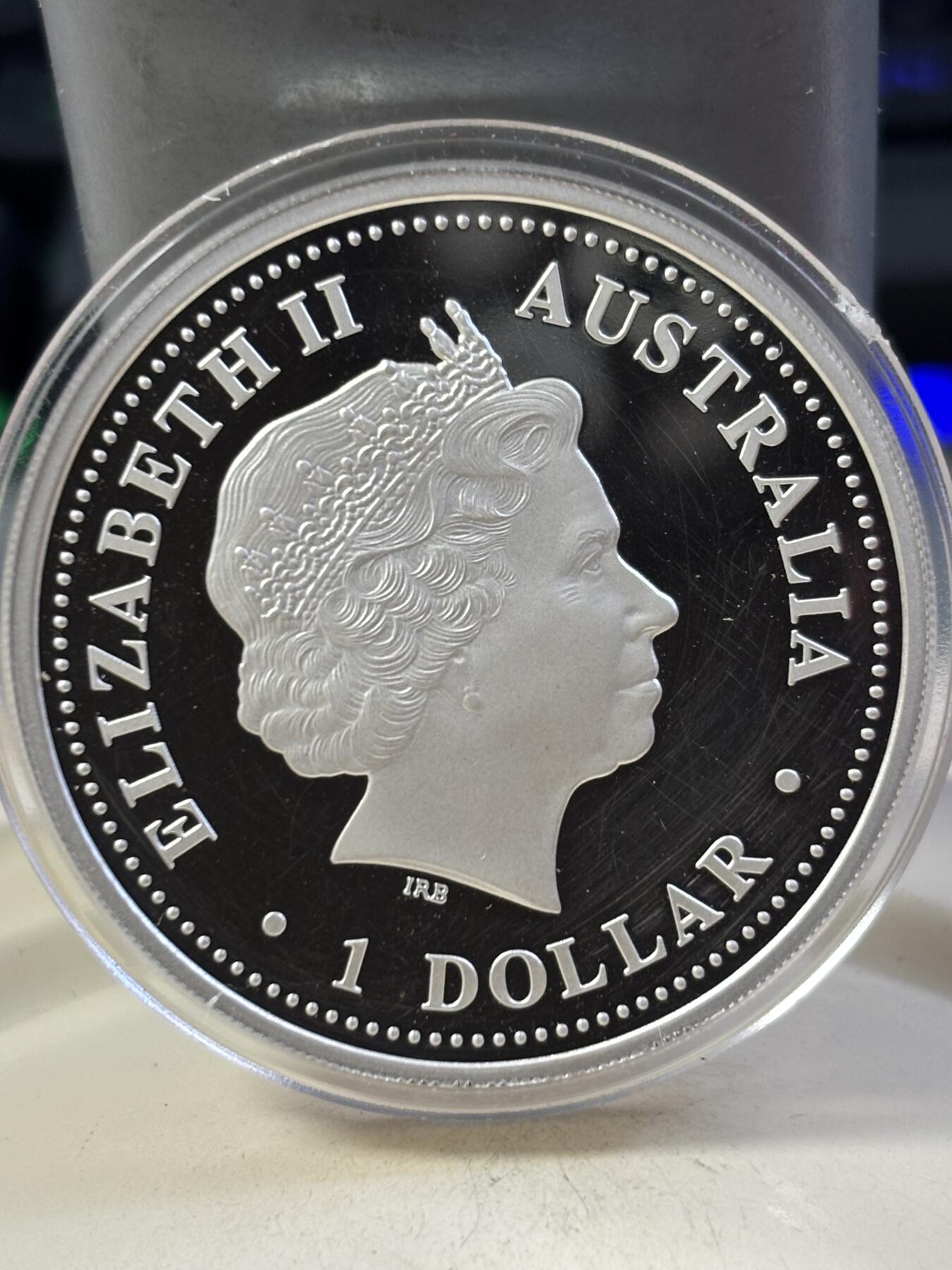 第187期拍卖 澳大利亚2007年生肖猪1盎司纯银精制纪念银币原盒，999银，币表面有划丝