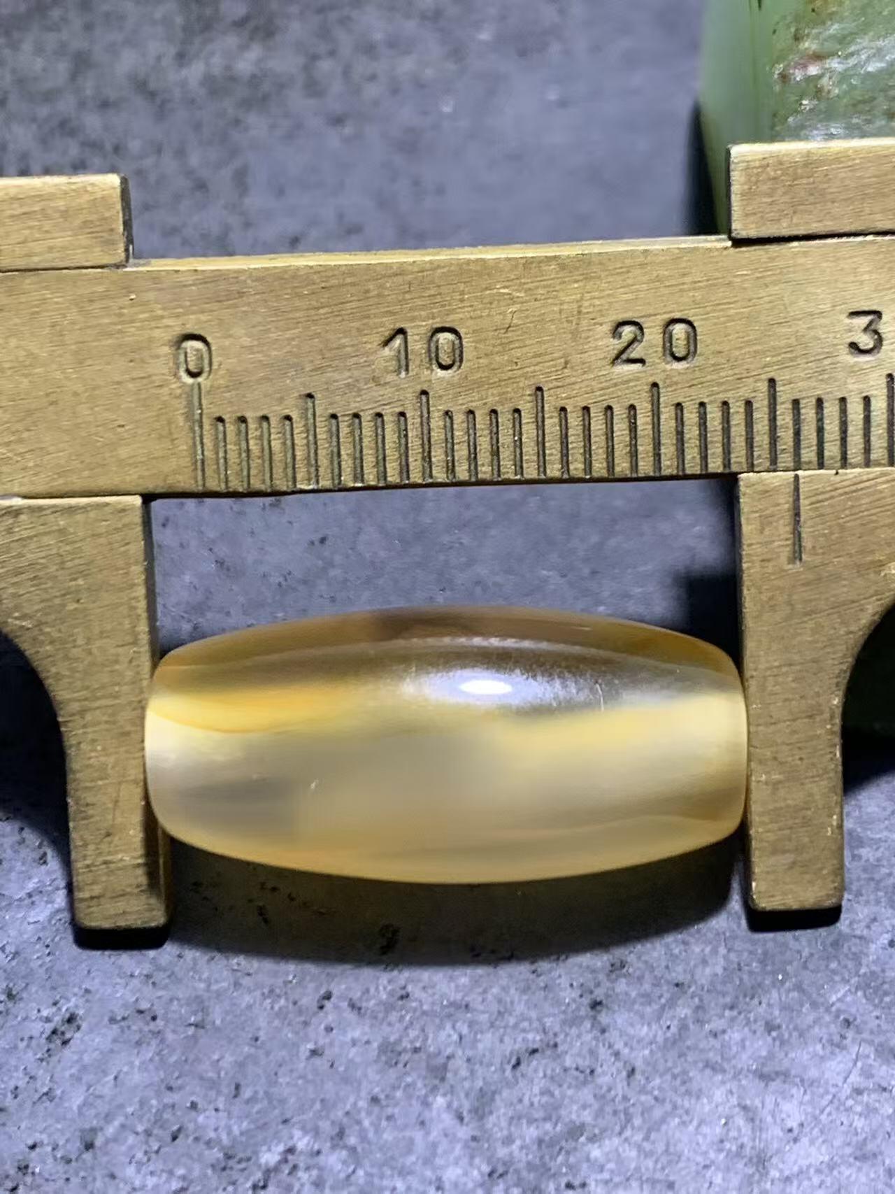 精美高玉化巴西玛瑙随形桶珠一颗，