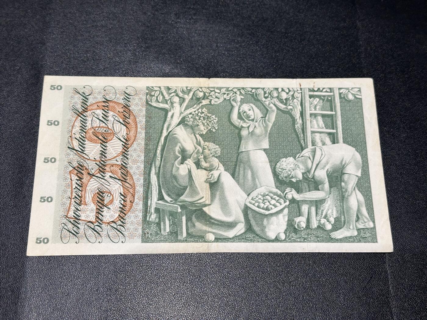 《外钞收藏家》第六百零一期（畅拍场）（本平台长期征集拍品、欢迎藏友们联系合作） 1961年瑞士50法郎 苹果园 有破口 非全新 品相如图