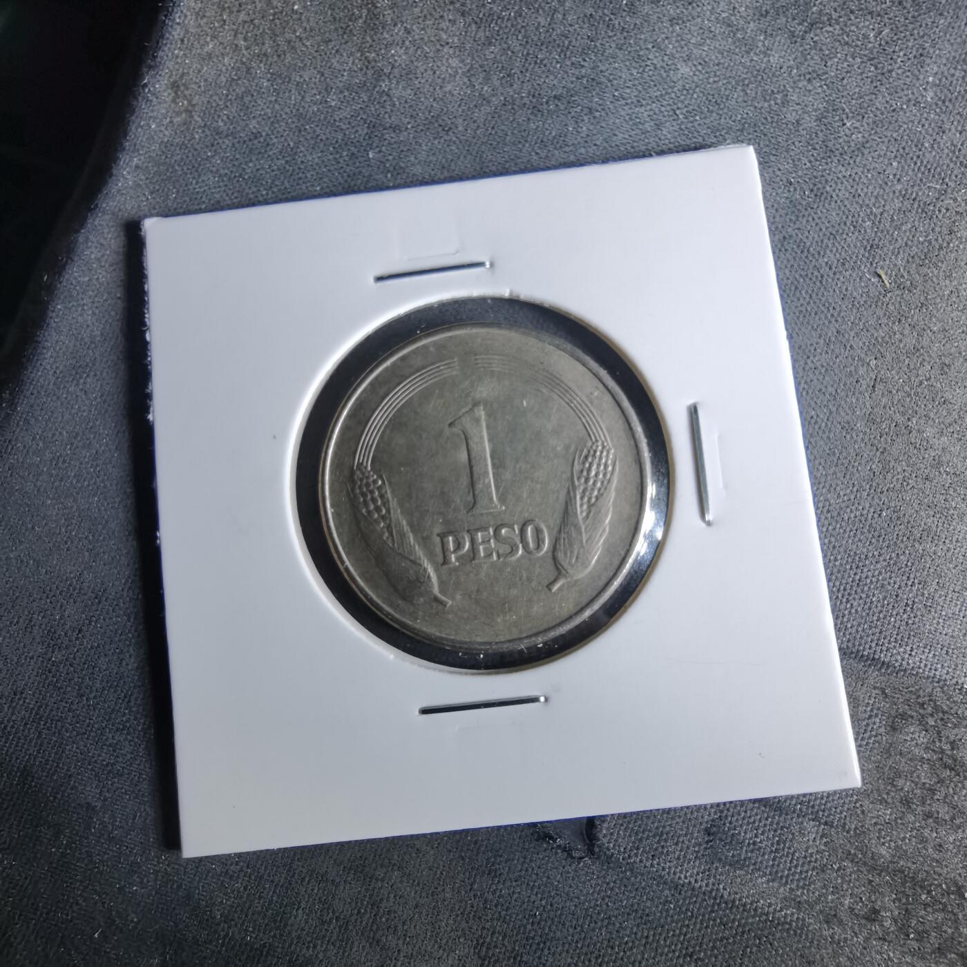 沼泽如烟--第956场 哥伦比亚1977年1比索