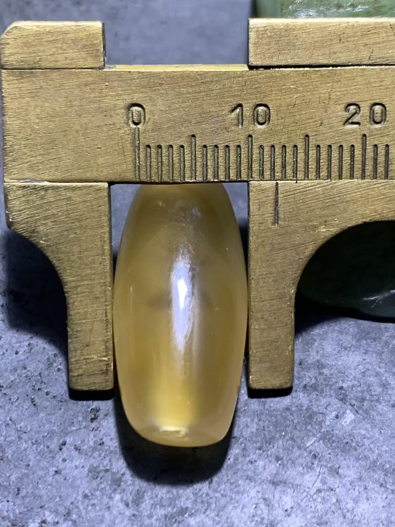 精美高玉化巴西玛瑙随形桶珠一颗，