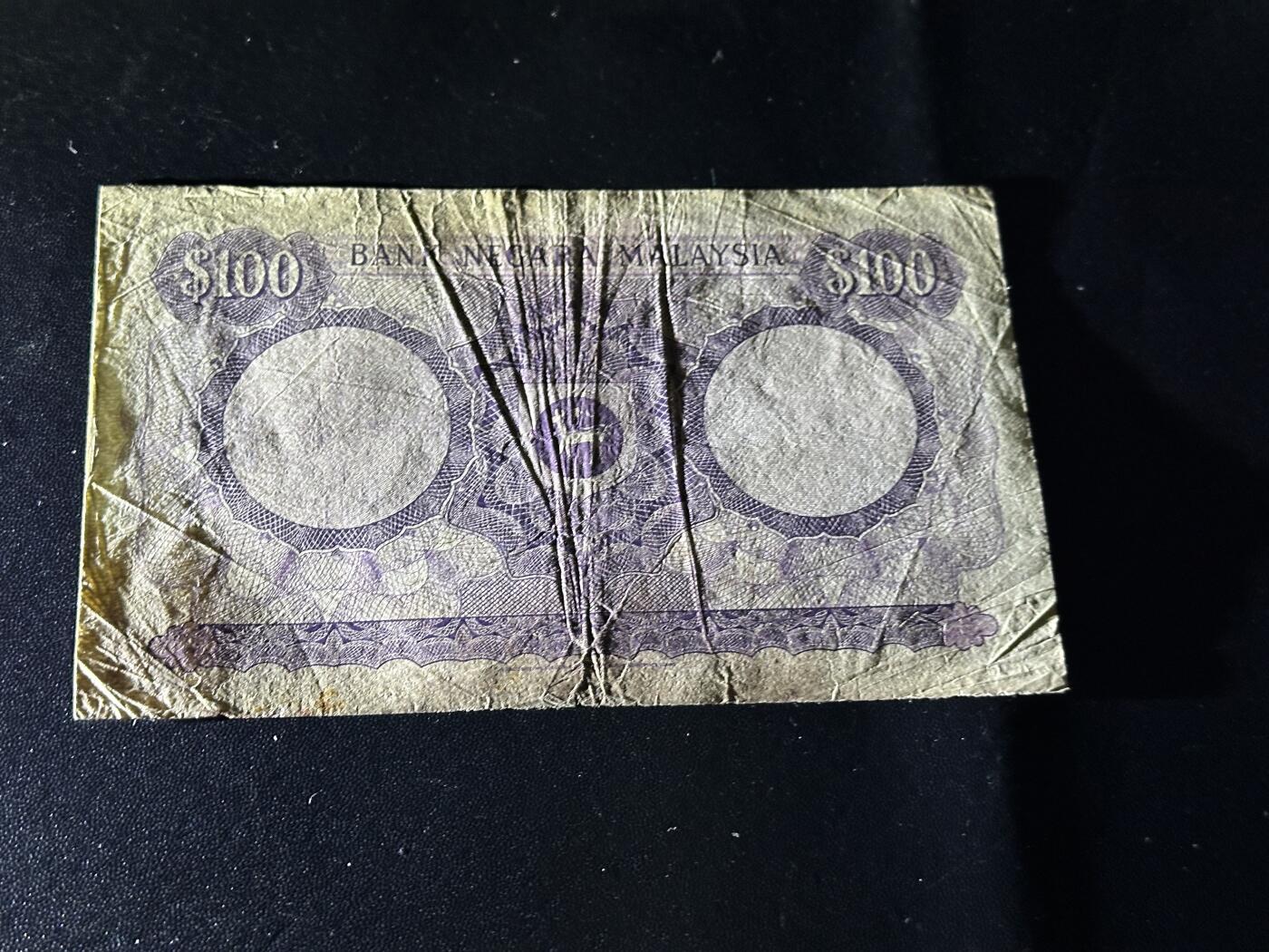 《外钞收藏家》第六百零一期（畅拍场）（本平台长期征集拍品、欢迎藏友们联系合作） 马来西亚第一版100林吉特 非全新 品相如图