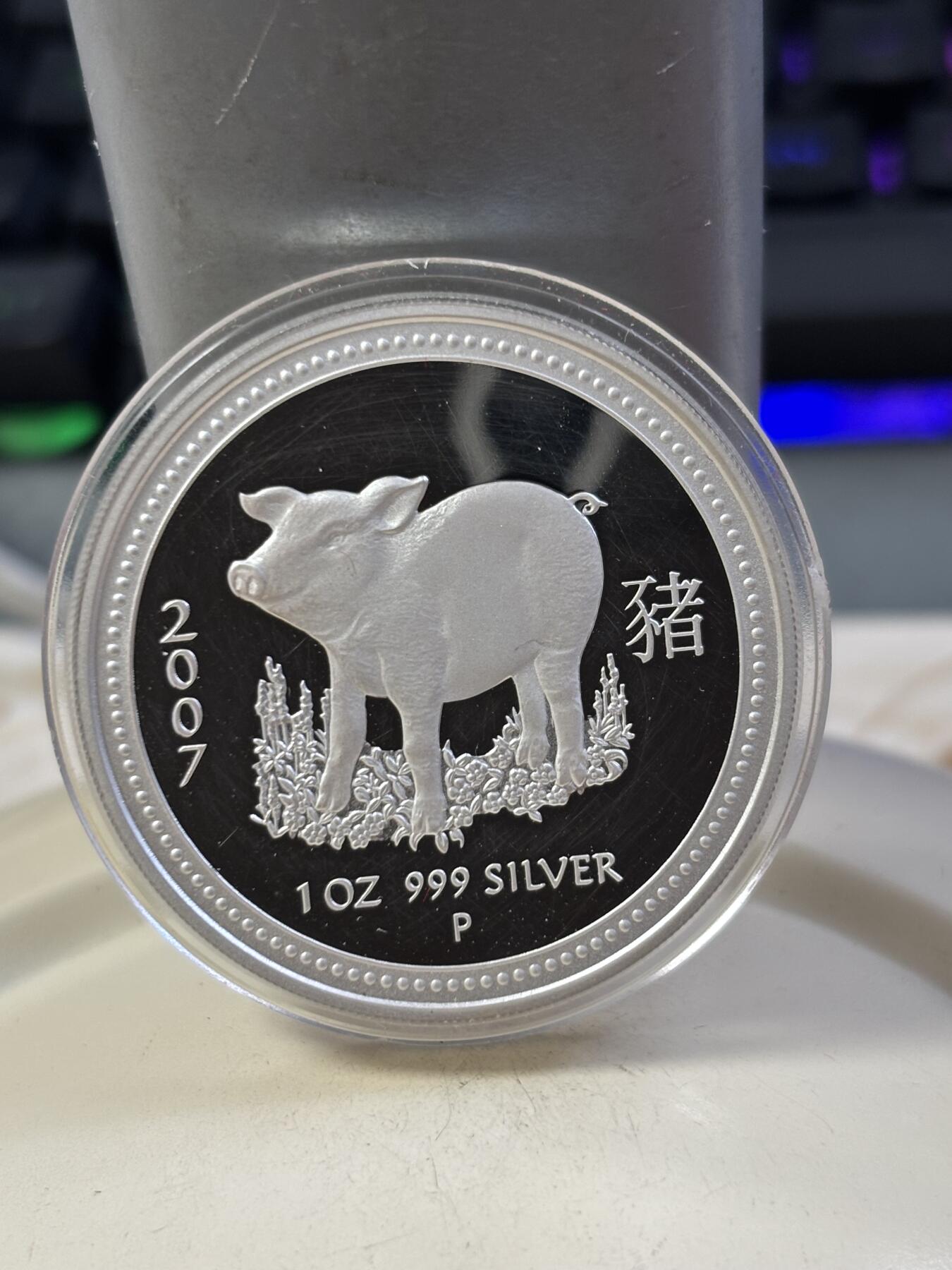 第187期拍卖 澳大利亚2007年生肖猪1盎司纯银精制纪念银币原盒，999银，币表面有划丝