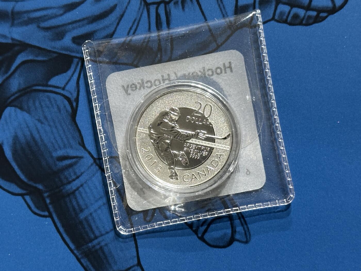 《外钞收藏家》第六百零一期（畅拍场）（本平台长期征集拍品、欢迎藏友们联系合作） 加拿大2013年20加元冰球运动卡装纪念精制银币（8g纯银）