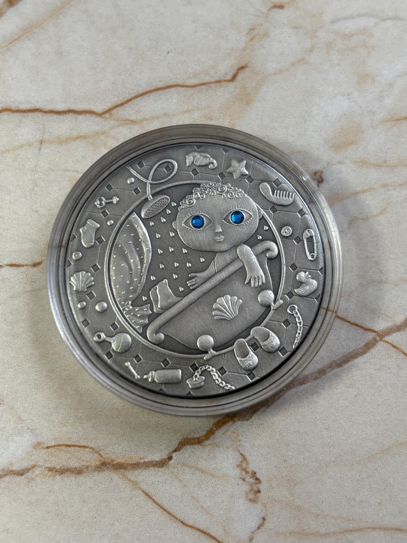 第187期拍卖 白俄罗斯2009年十二星座系列水瓶座镶嵌皓石银币，925银，28.28克，发行25000枚