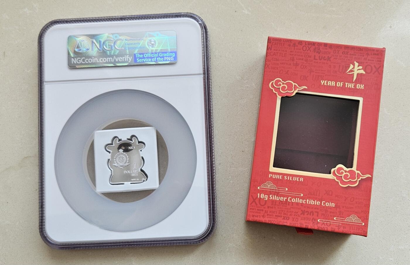 【币将精彩】世界钱币拍卖（2026-2-4） 纽埃2021年卡通牛彩色银币NGC评级币