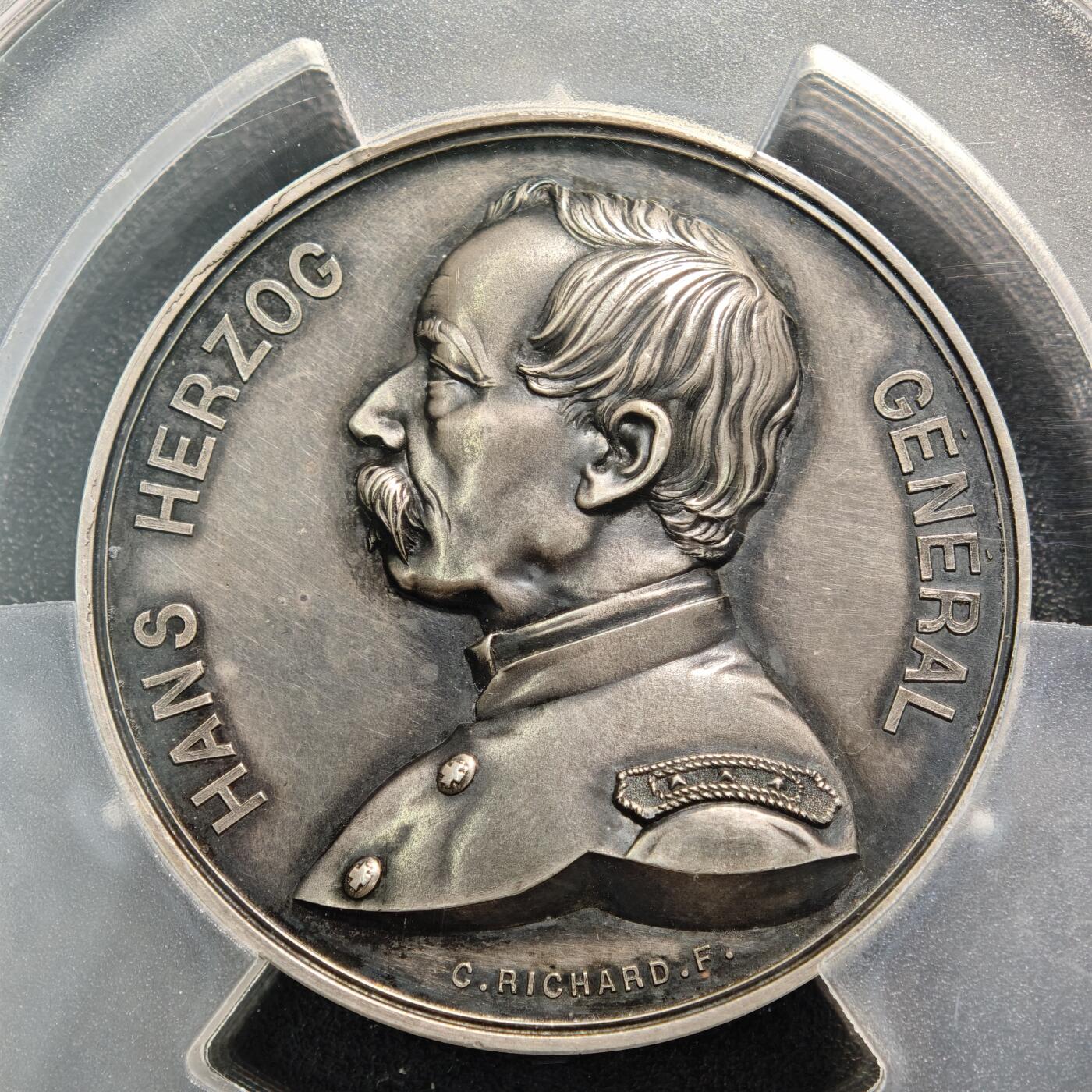 【德藏】世界币章拍卖第161期 1871年 瑞士汉斯赫尔佐格将军胜利女神高浮雕50mm镀银大铜章 立体感极强 人物刻画传神 PCGS SP62