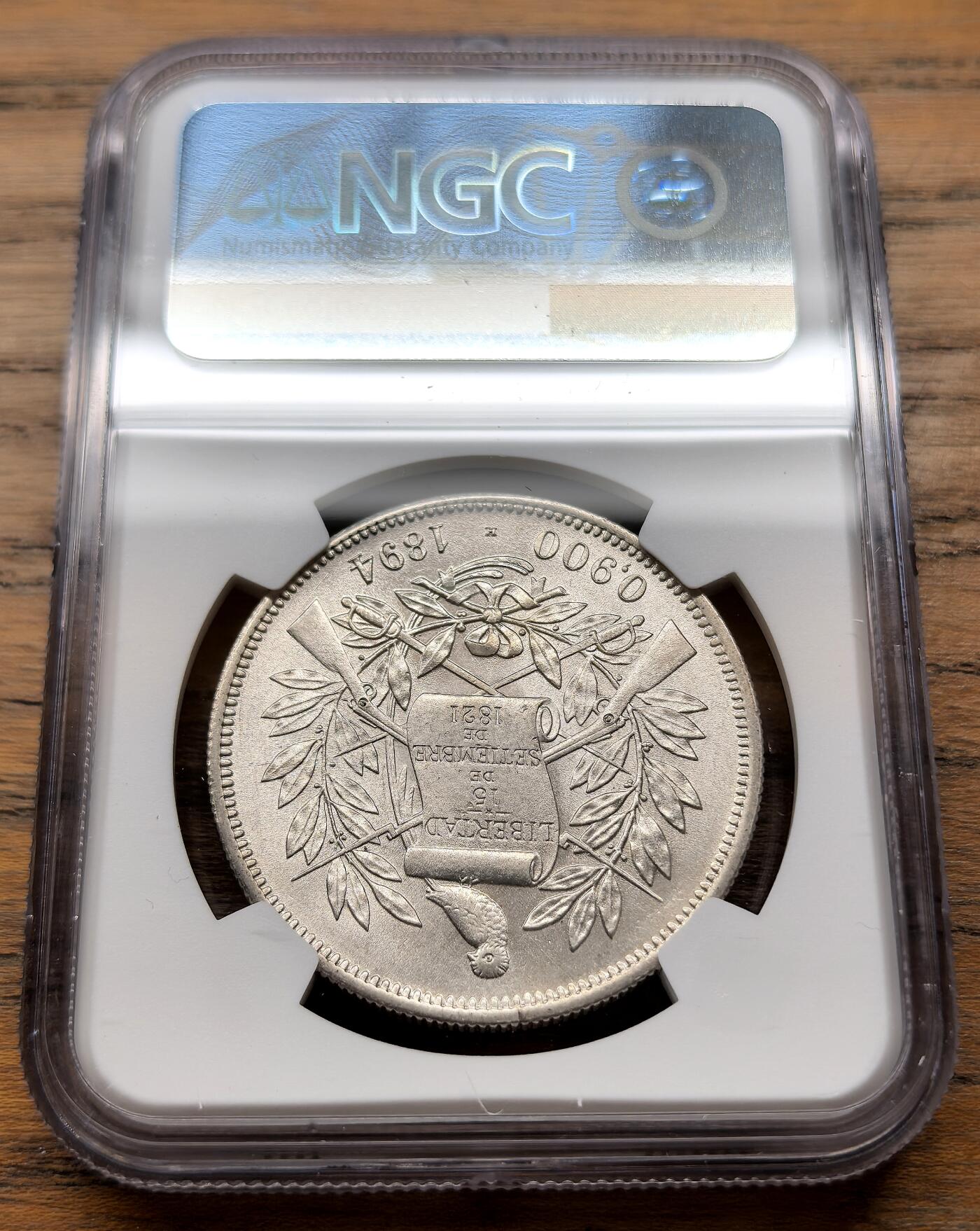 凡希社世界钱币微拍第三百十八期 1894H危地马拉执丰饶角的女神peso大银NGC-MS64，光泽亮丽饱满的收藏级品质！