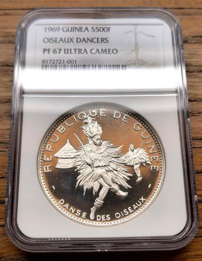 凡希社世界钱币微拍第三百十八期 - 1969几内亚羽毛舞者500法郎大银精铸NGC-PF67UC