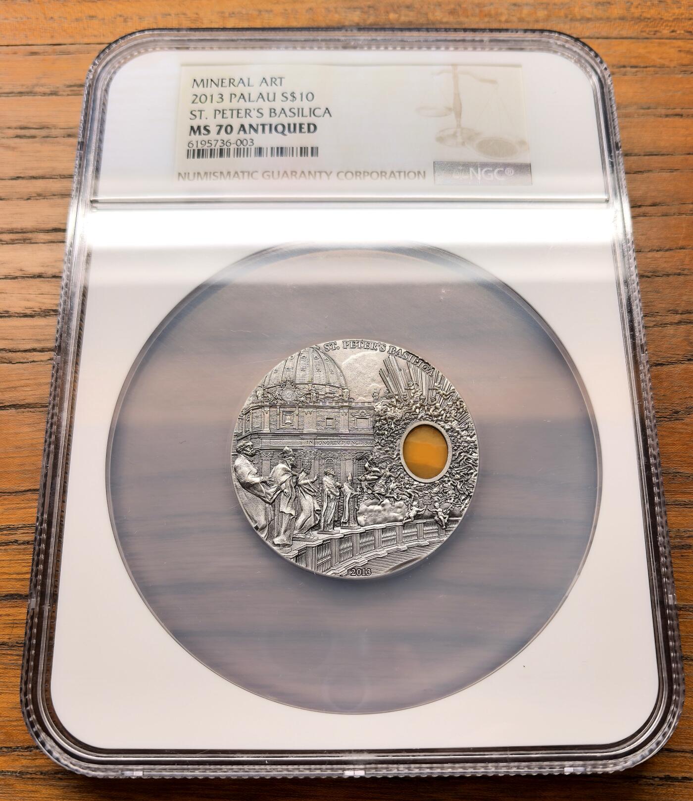 凡希社世界钱币微拍第三百十八期 2013帕劳矿物艺术—圣彼得大教堂10元仿古大银NGC-MS70，天然矿物镶嵌，顶级品相。