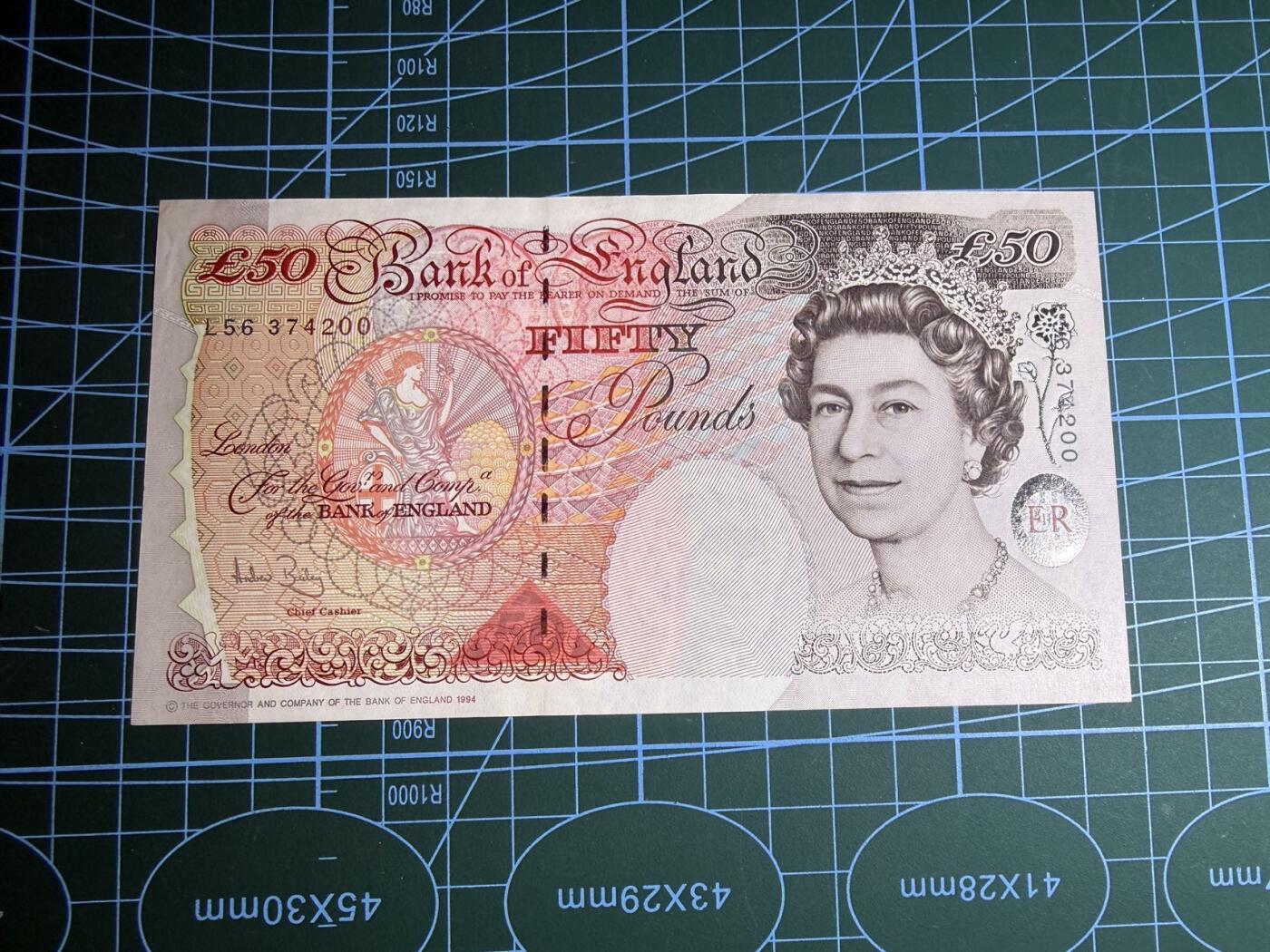 【炜奕收藏】，第五十六期，大不列颠专场 英国E序列50镑，UNC-品相，小压痕