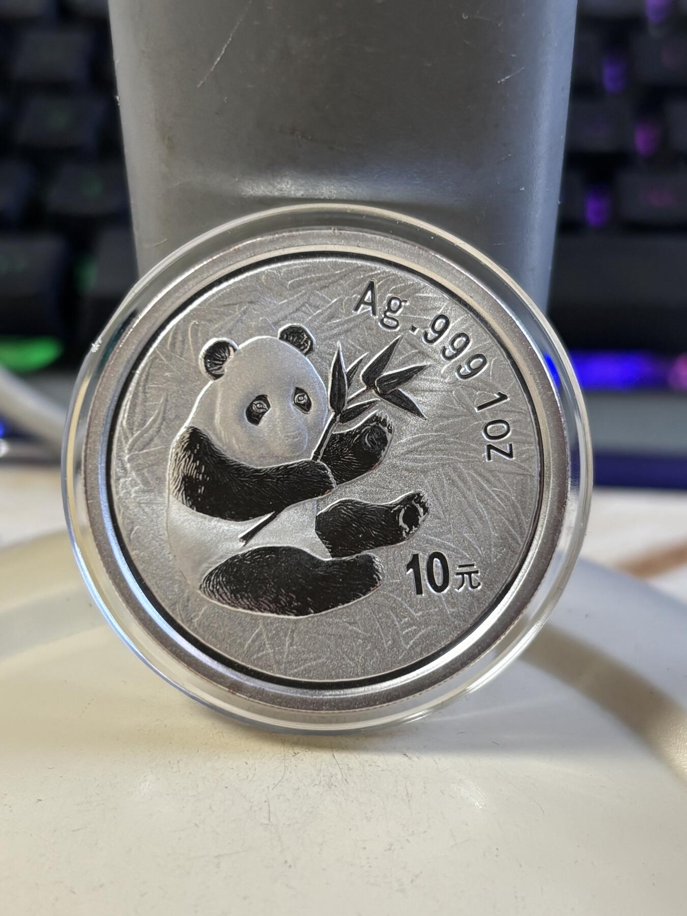 第187期拍卖 中国2000年广州国际邮票钱币博览会纪念镀金银币，999银，1盎司，发行40000枚