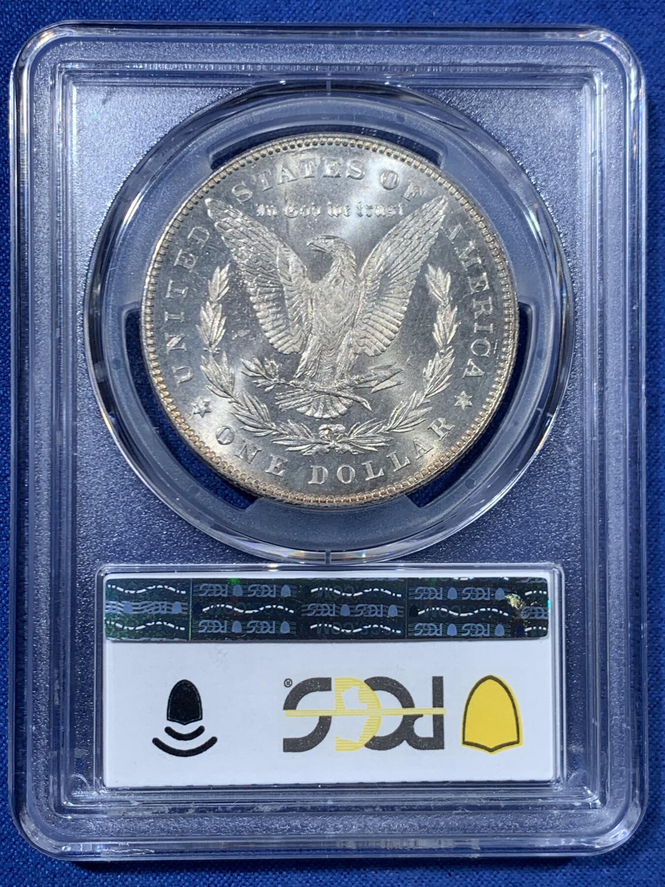 《竞宝斋》第456场 周日，周一，周二   3场连拍 （全场包邮）欢迎送拍 PCGS MS64 美国 1878 首年摩根 7/8 尾部羽毛复打 稀有版别 麦稀奇所见最高分 此枚霜感十足 打制深俊 发丝清晰