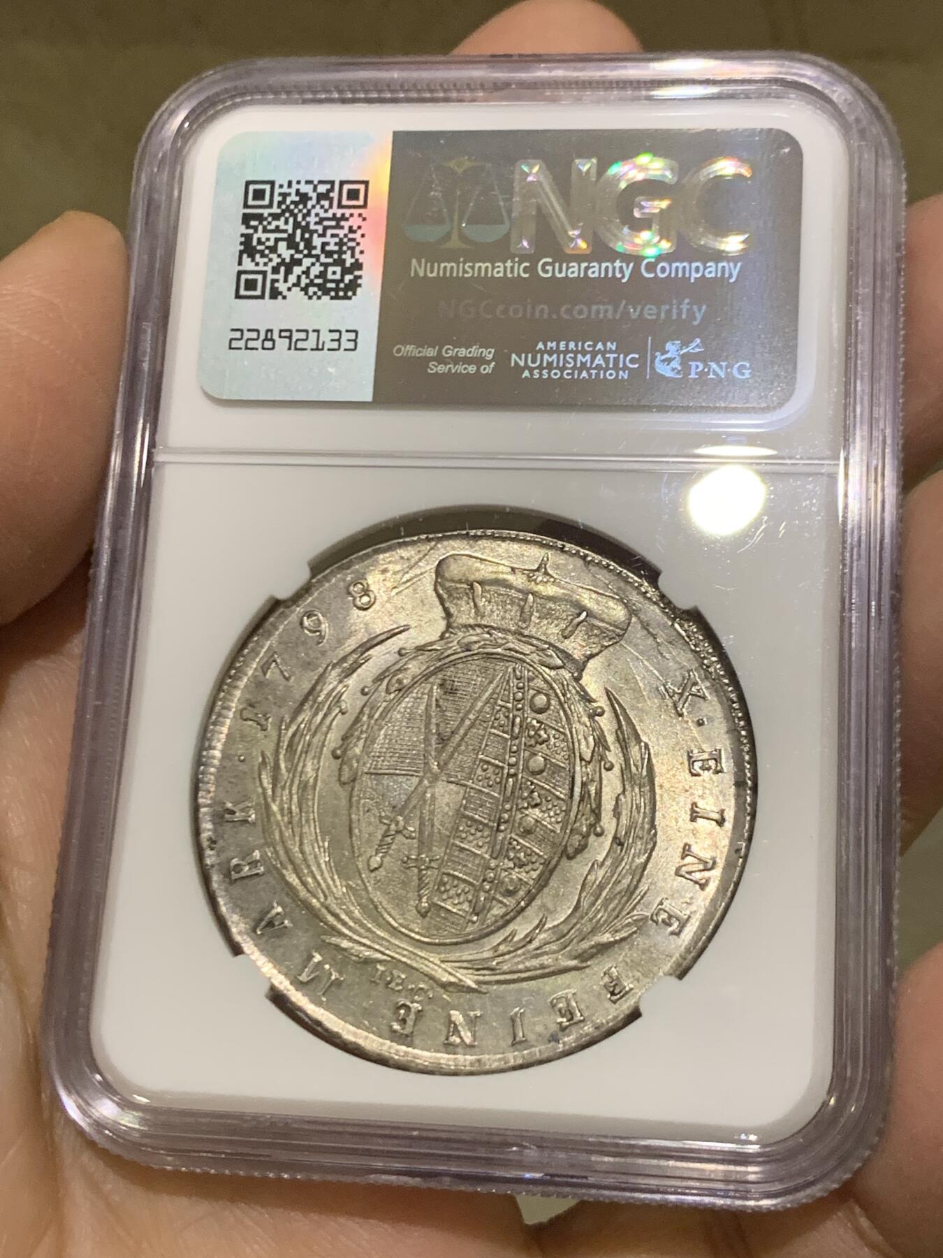 《竞宝斋》第456场 周日，周一，周二   3场连拍 （全场包邮）欢迎送拍 NGCMS62+ 神圣罗马帝国时期1798年萨克森选侯国1泰勒银币，正面是作为帝国元帅的萨克森选帝侯胖特烈奥古斯特三世军装版，属于62分中状态最佳的，更高分仅3枚，原始光度保留的非常好，不可多得的好状态