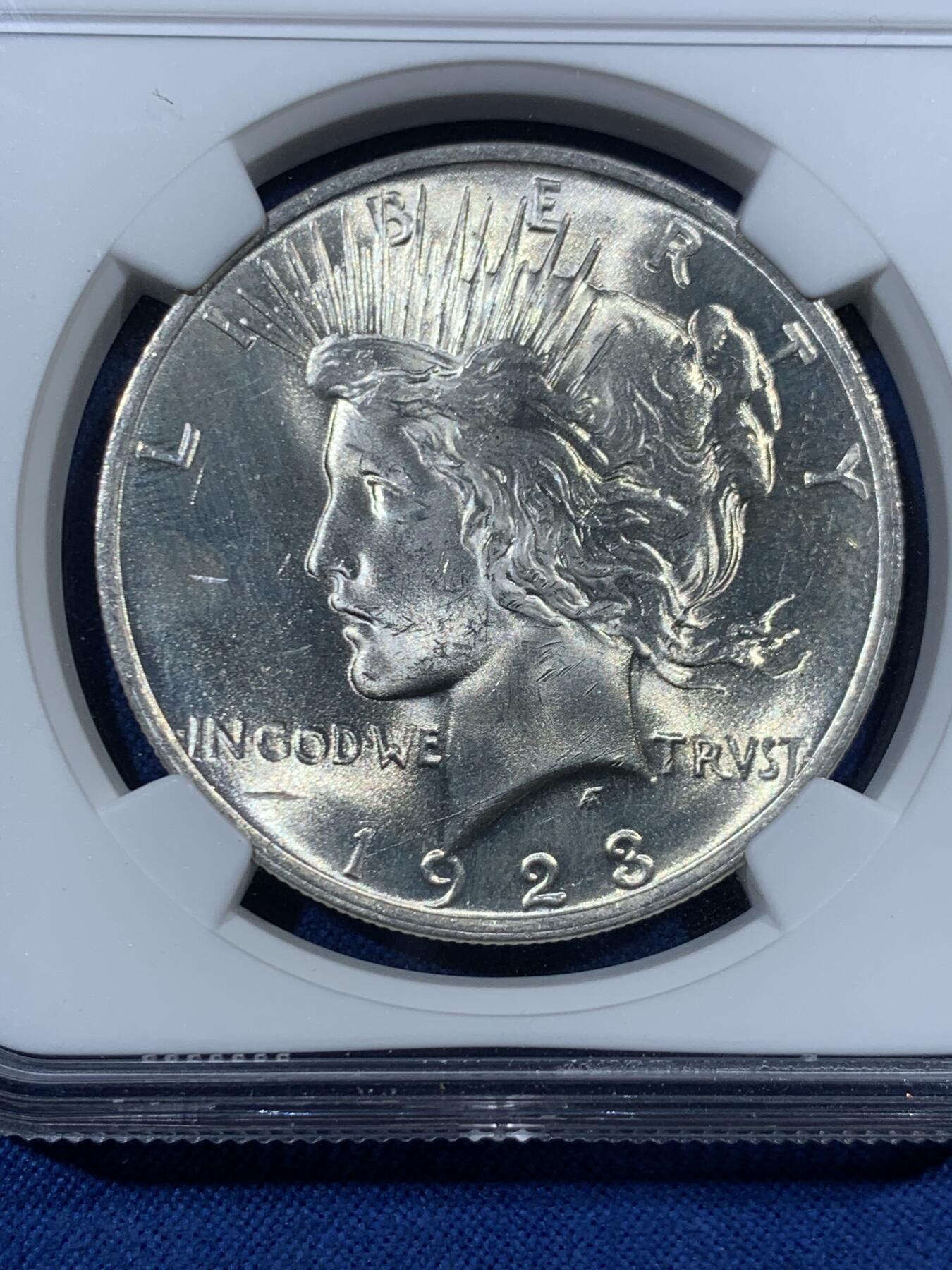 《竞宝斋》第456场 周日，周一，周二   3场连拍 （全场包邮）欢迎送拍 NGC MS63 美国 1923年 和平 1美元 银币 白亮转光