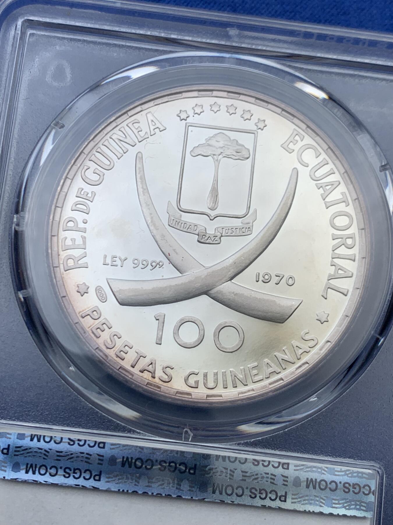 《竞宝斋》第456场 周日，周一，周二   3场连拍 （全场包邮）欢迎送拍 PCGS PR67DCAM 赤道几内亚 1970年 100比塞塔 大银币 戈雅裸女设计 精致工艺 正面淡紫色包浆