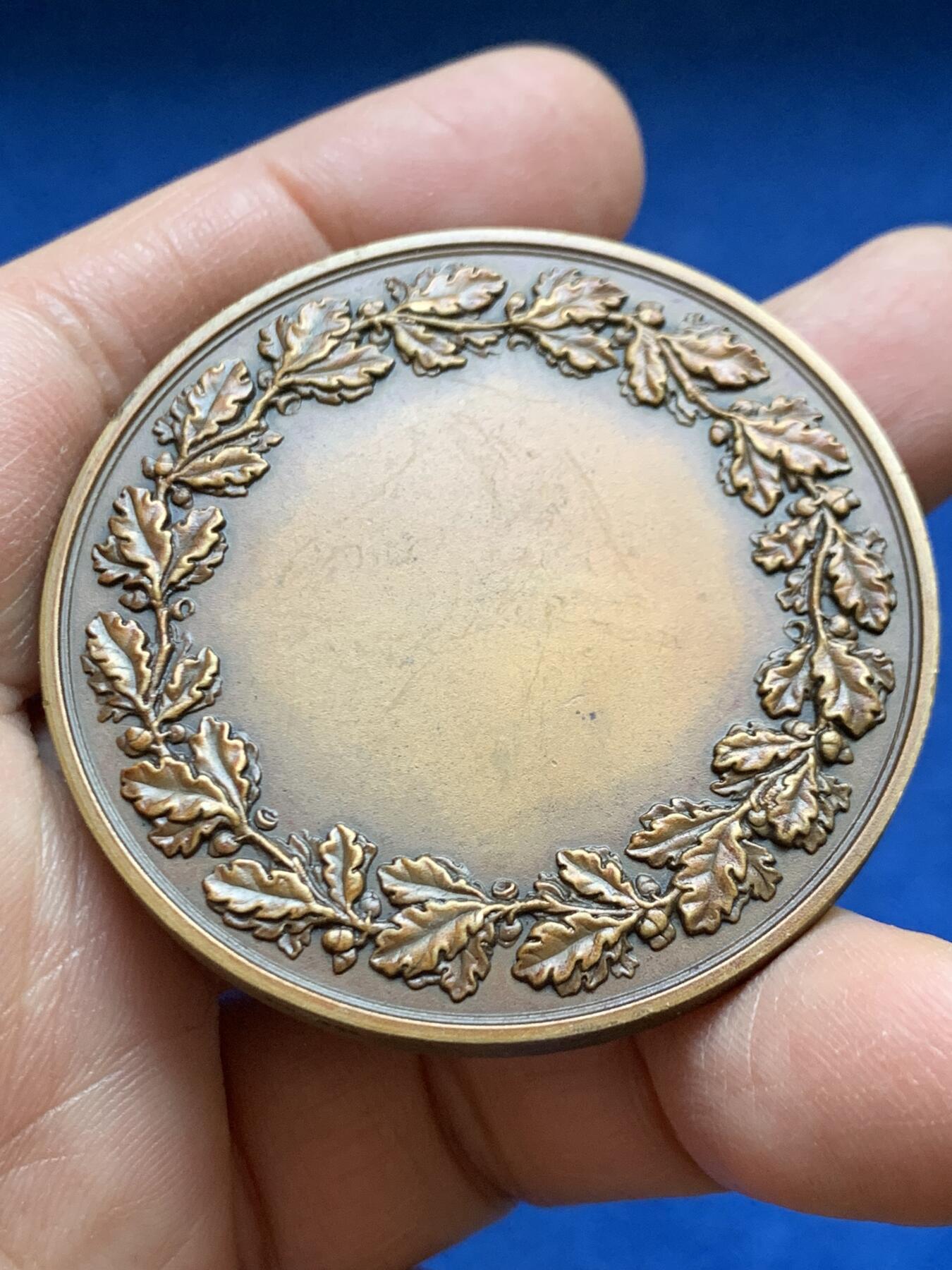 《竞宝斋》第456场 周日，周一，周二   3场连拍 （全场包邮）欢迎送拍 法国小飞侠铜章 H. PONSARME作品 62.1克 50.6mm 丰饶角铜标