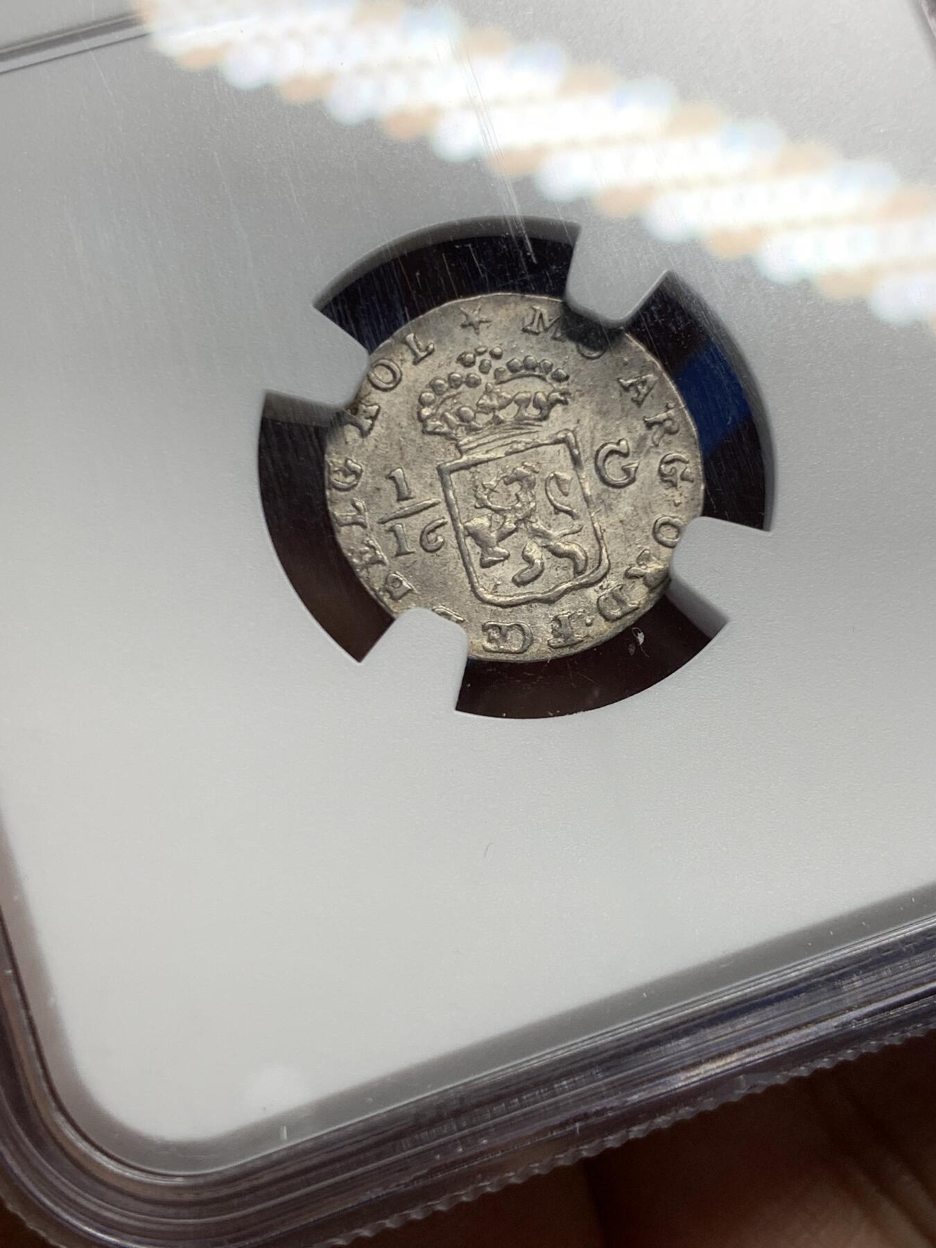 《竞宝斋》第456场 周日，周一，周二   3场连拍 （全场包邮）欢迎送拍 NGC UNC 荷属东印度群岛 1802年  巴达维亚共和国（1800-1806） 1/16古尔登 银币 自然状态 感觉错杀了