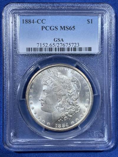 《竞宝斋》第456场 周日，周一，周二   3场连拍 （全场包邮）欢迎送拍 - PCGS MS65 美国 1884 CC 摩根银币卡森厂 高分难得 十字转光 盒子左下角有磕 细节见图