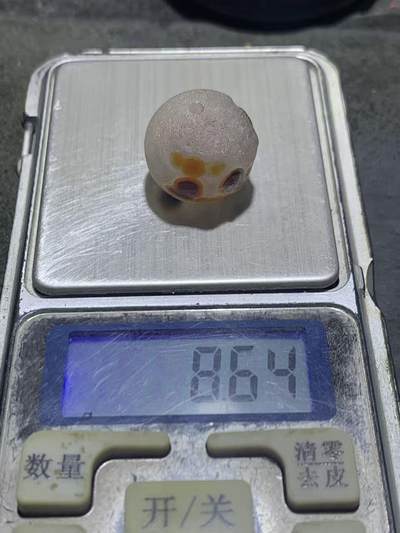 精美冰飘风化纹8字天眼图案战国红玛瑙随形珠一个， 精美冰飘风化纹8字天眼图案战国红玛瑙随形珠一个，