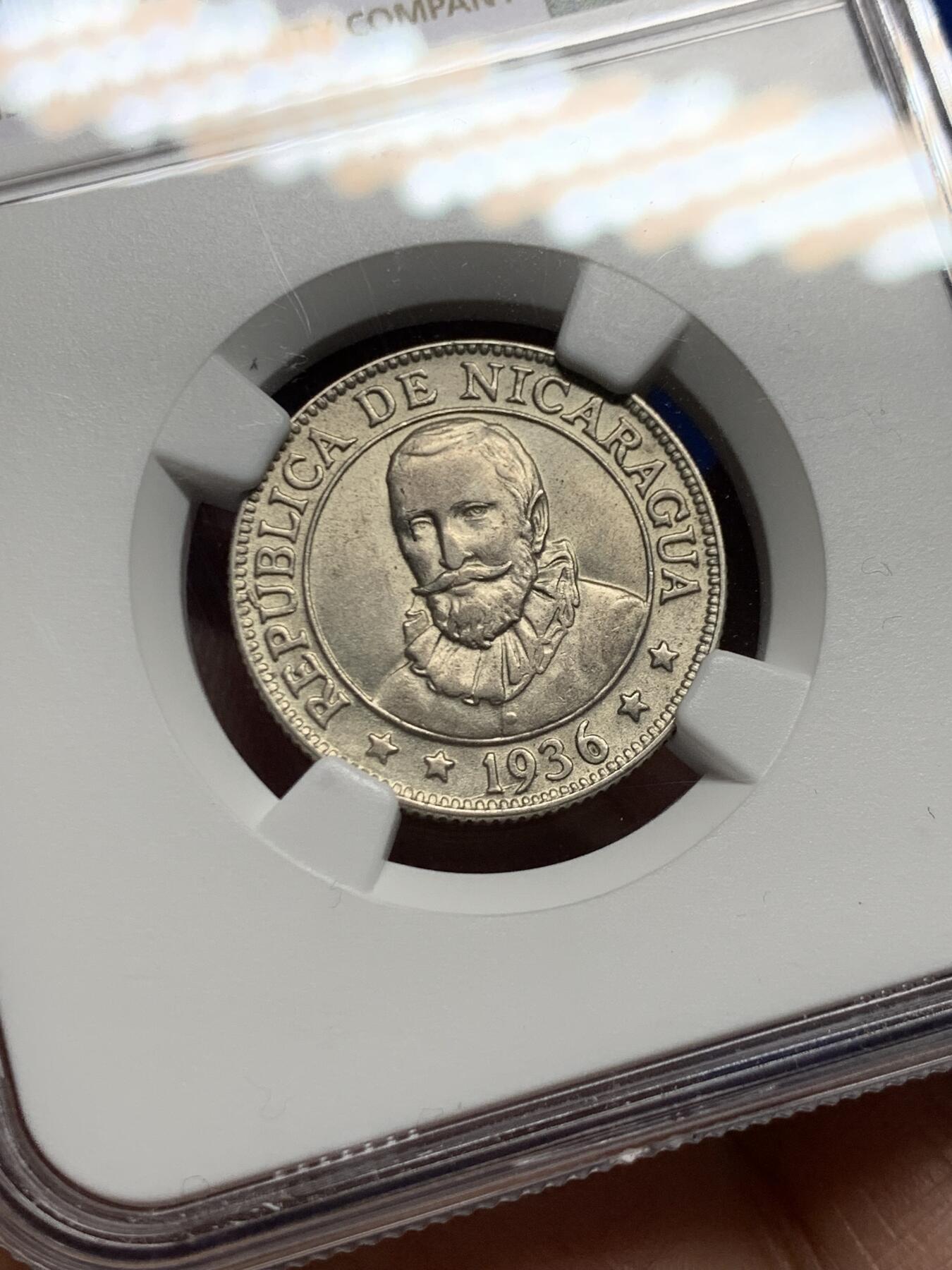 《竞宝斋》第457场 周日，周一，周二   3场连拍 （全场包邮）欢迎送拍 NGC MS64 尼加拉瓜1936年25分银币，属于该国最后一套银本位货币之一，稀有，铸造量仅10万枚，由美国费城造币厂代为铸造，本币为冠军分！拉丁美洲的老银币未来是重点投资方向，增值潜力大。