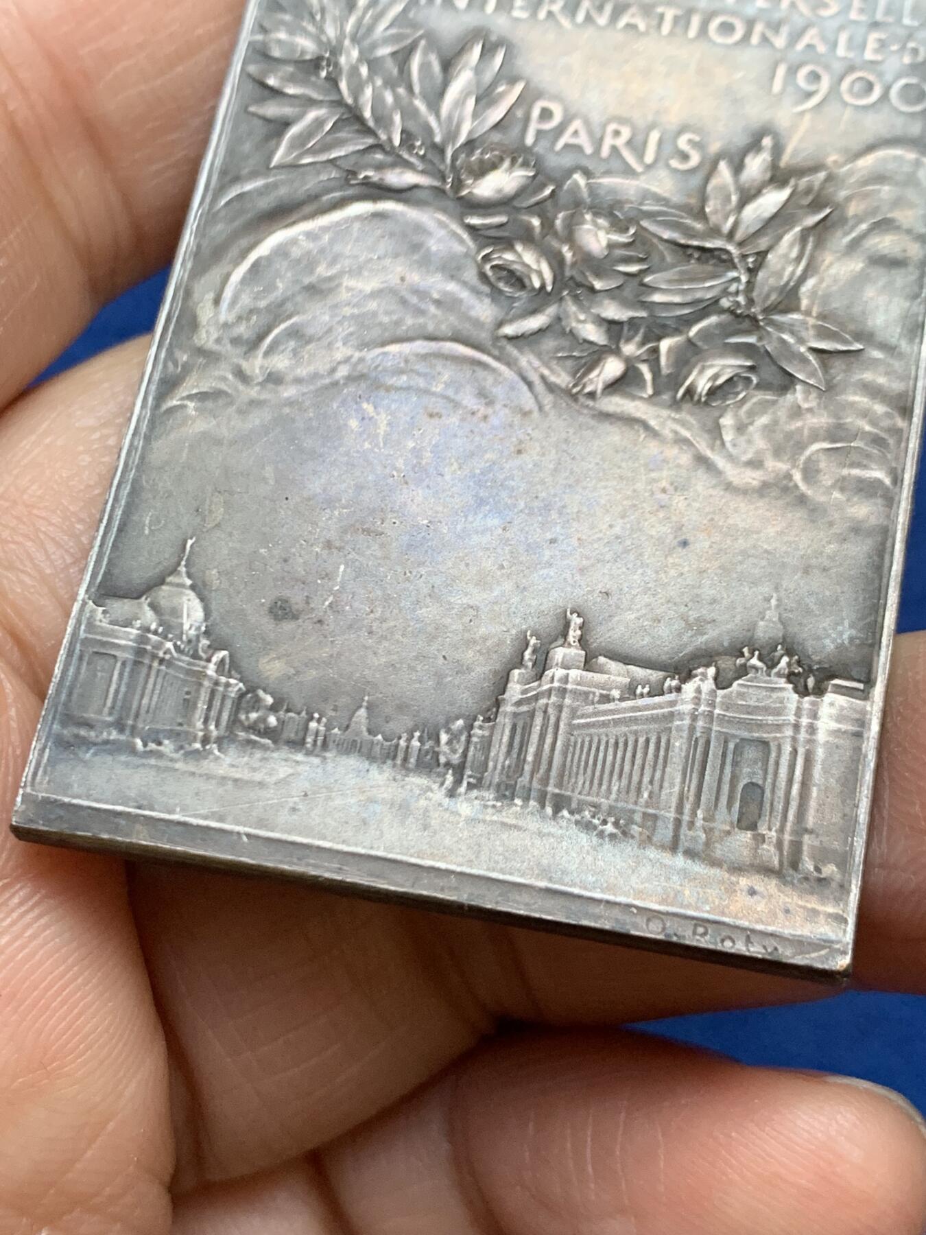 《竞宝斋》第457场 周日，周一，周二   3场连拍 （全场包邮）欢迎送拍 法国 罗蒂代表作 1900巴黎世博会 方型镀银铜章 50.8mm*36mm 37.8g 丰饶角铜标