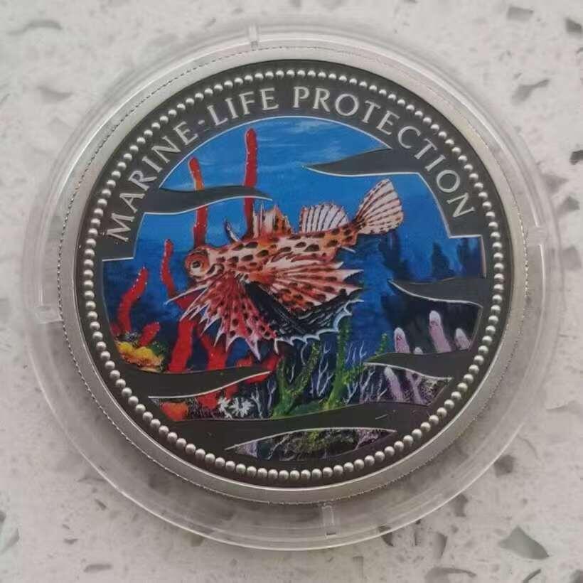 【币将精彩】世界钱币拍卖（2026-1-28） 帕劳2002年美人鱼海洋世界鱼类彩色纪念币  面值1元，铜镍合金 直径38.61毫米，精制。