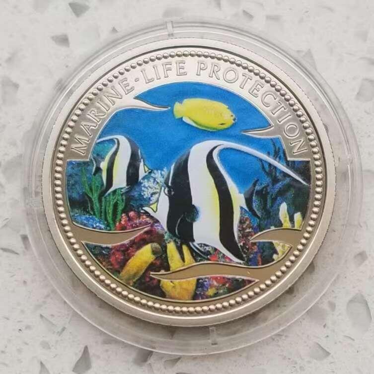 【币将精彩】世界钱币拍卖（2026-2-4） 帕劳2001年海洋世界燕鱼彩色纪念币  面值1元，铜镍合金 直径38.61毫米，精制。