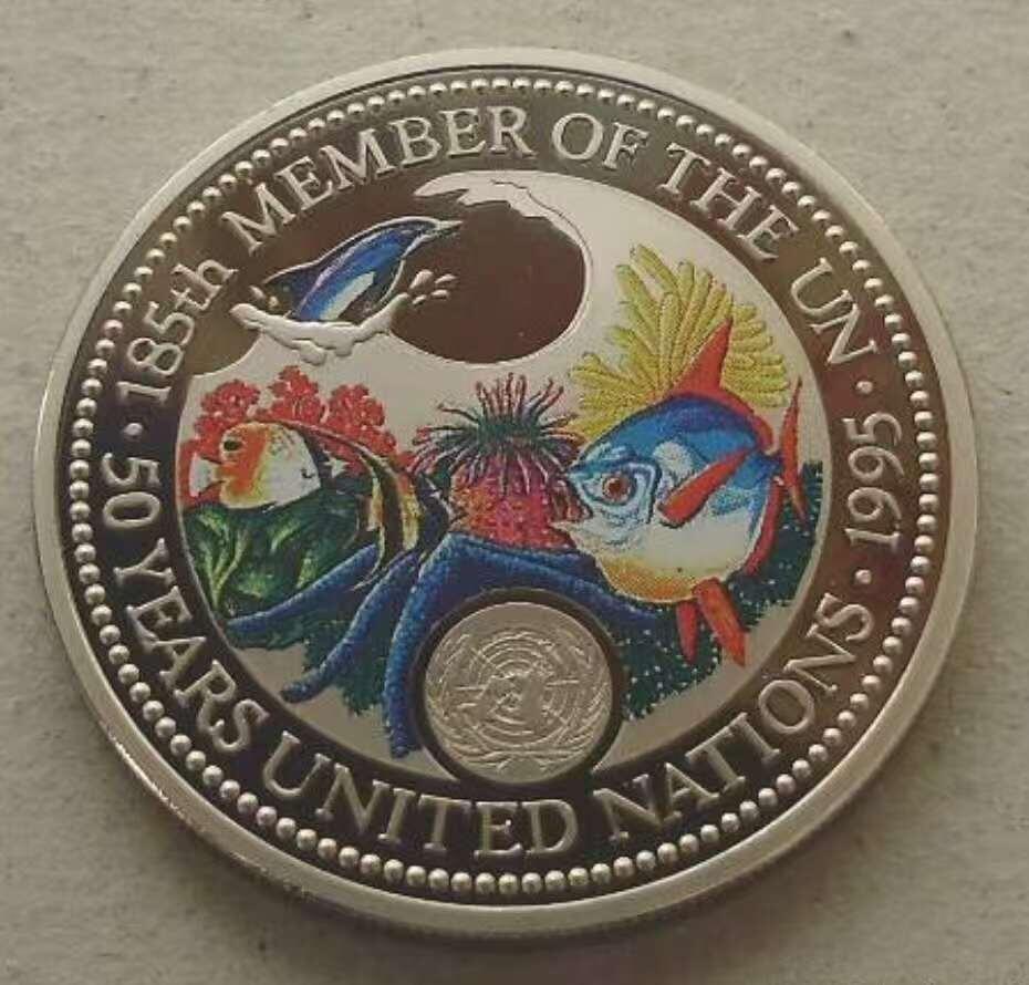 【币将精彩】世界钱币拍卖（2026-2-4） 帕劳2003年海洋世界鱼类幻彩镍币  面值1元，铜镍合金 直径38.61毫米，精制。