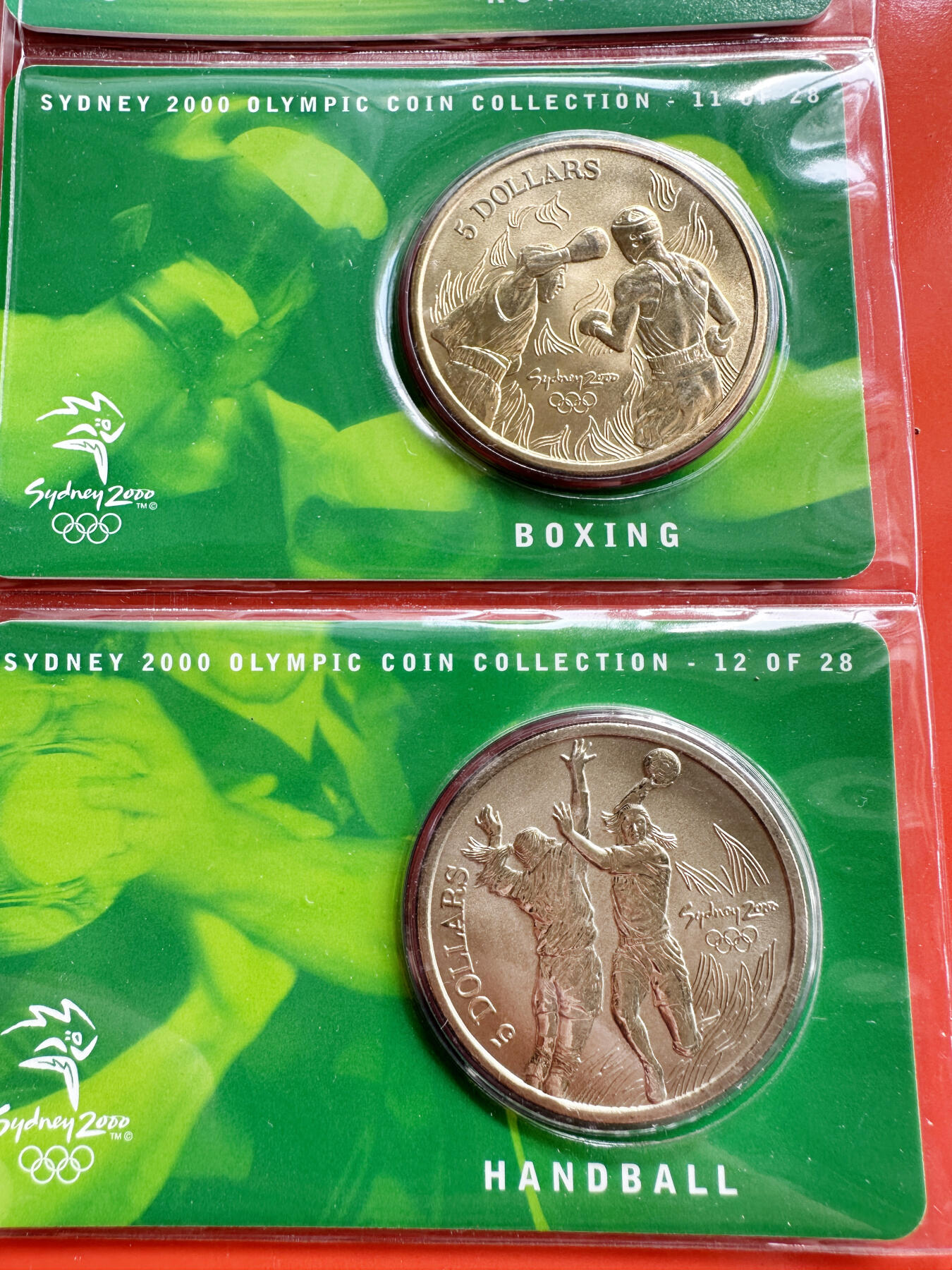 【俄甄集藏】“万象更新、马呈祥瑞”迎新春俄甄精品场-2026年(047)01-21 星期三 晚 19:30 全场包邮 澳大利亚2000年悉尼奥运会5元纪念币28枚卡装+纪念章册装29枚大全套，少见