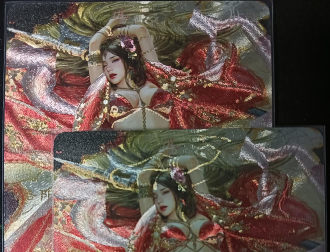 花开卡拍第61期（3月7号周六截拍，品控勿拍!!!拍品不寄存，运费5元（新疆需补运费差价或顺丰到付），自制卡难免瑕疵，可能存在轻微撞角爆边等出厂瑕疵，品控介意勿拍！） 1、燎原人间传 特卡 貂蝉 粗闪一对