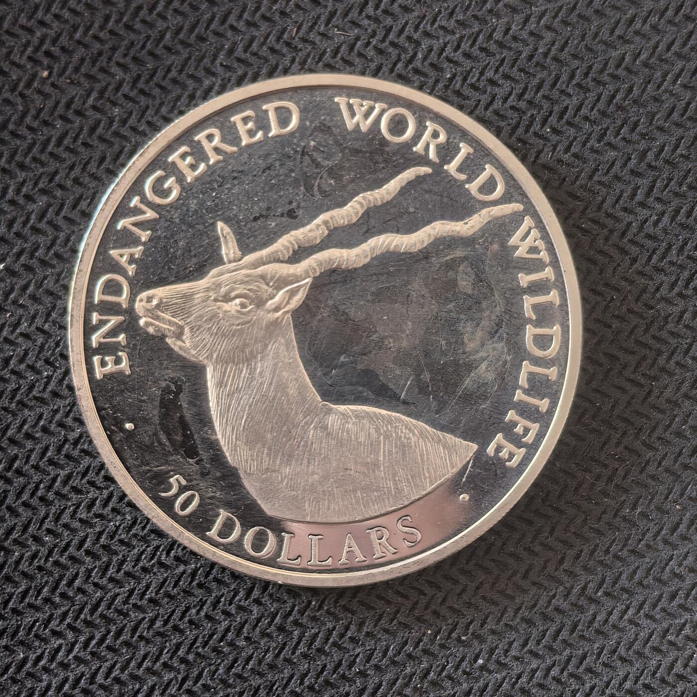 道一币馆币章第一百六十三场 库克岛1990年野生动物保护长角羊50元精制银币  19.2g 925s