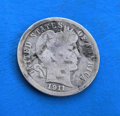 外国优质银币南亚香港苏联等专场，周六九点倒数截拍，满百包邮，持续收拍 - 美国1911年巴伯 10 美分银币，正面是巴伯设计的自由女神侧面像，轮廓虽经磨损仍显优雅；背面为橄榄枝环绕的 “ONE DIME” 字样，承载美国早期流通币历史，银质包浆温润，兼具复古质感与收藏价值。