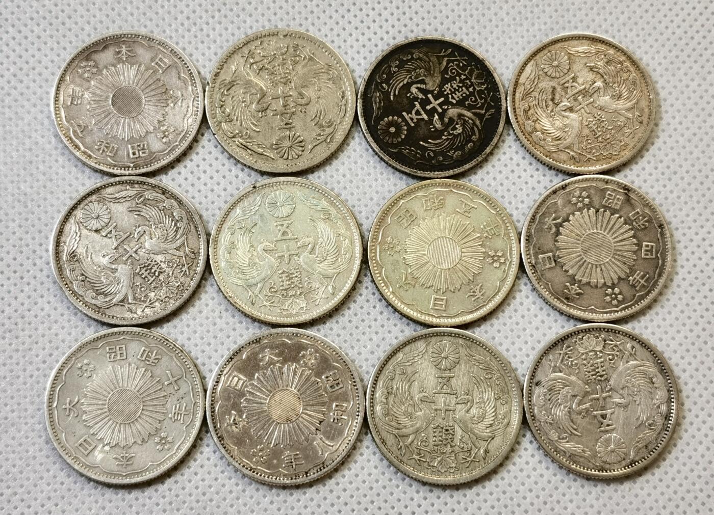 甄臻铺-世界币章拍卖（第48期）精品场拍品征集中，送拍享返佣金等优惠多多 日本 双凤五十钱银币 全部小特年12枚一组