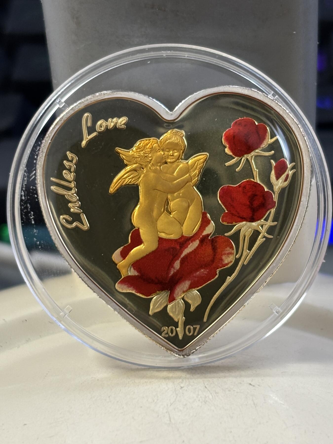 第188期拍卖 帕劳2007年天使玫瑰无尽的爱心形纪念银币，925银，25克，发行2500枚
