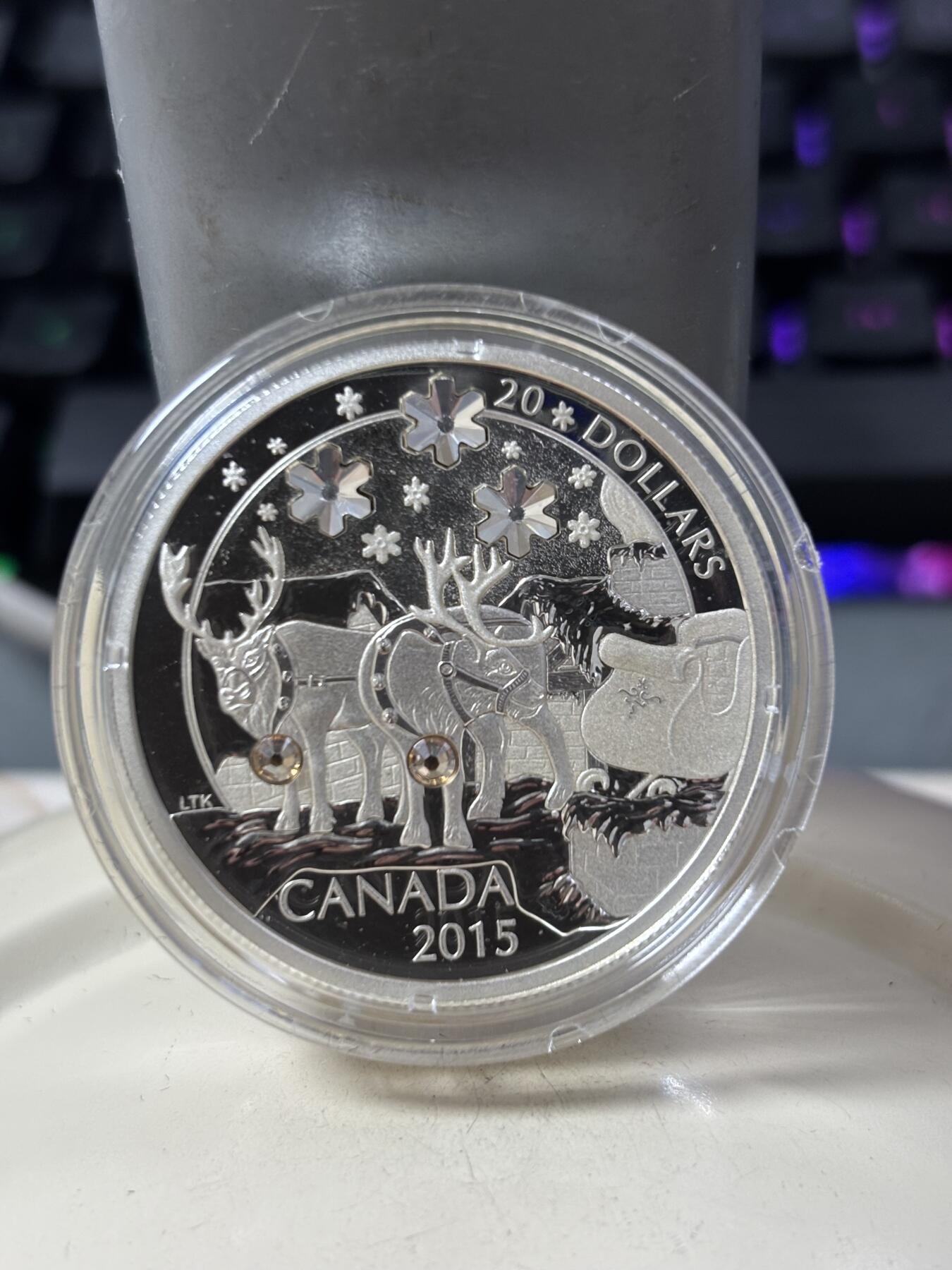 第188期拍卖 加拿大2015年圣诞节系列麋鹿镶嵌黄水晶银币,9999银，1盎司，发行量7500枚