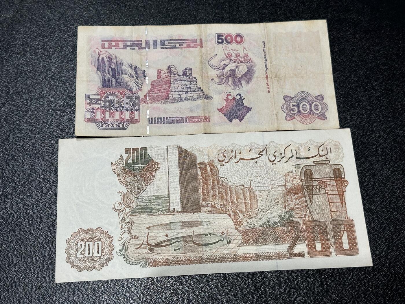 《外钞收藏家》第六百零三期（精选场）（本平台长期征集拍品、欢迎藏友们联系合作） 阿尔及利亚200和500里亚尔 非全新品相如图