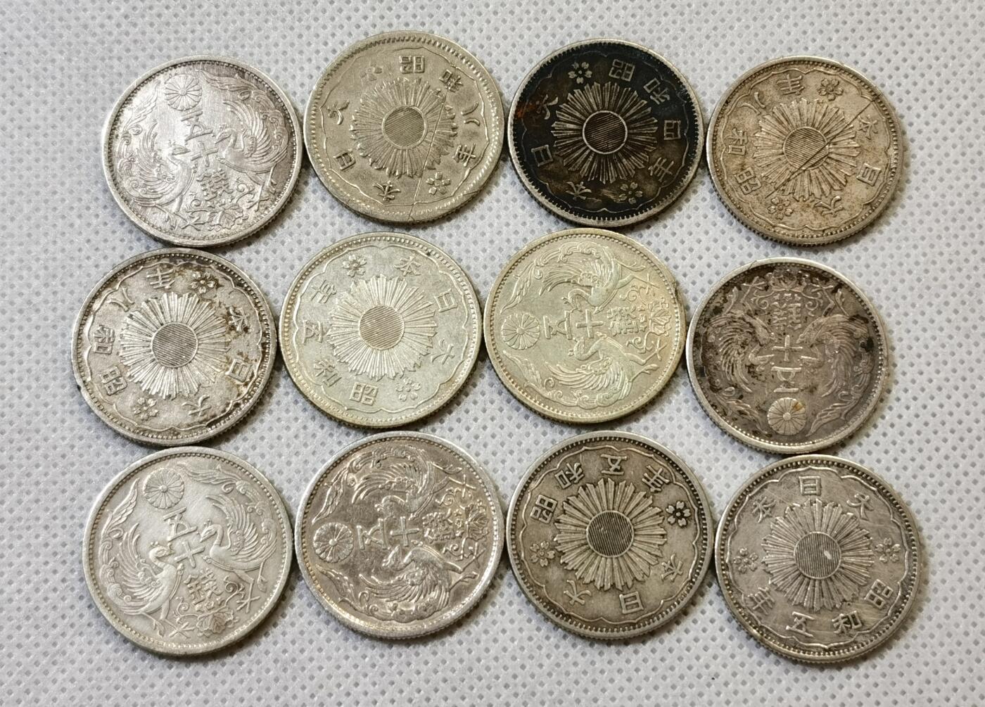 甄臻铺-世界币章拍卖（第48期）精品场拍品征集中，送拍享返佣金等优惠多多 日本 双凤五十钱银币 全部小特年12枚一组